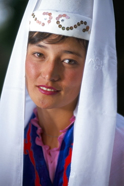 Otoraigur girl in national dress, near Balikchi, Kyrgyzstan, Central Asia, Asia