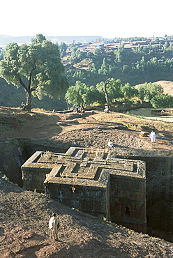 Sunken, rock-hewn Christian church, in rural landscape, Lalibela, UNESCO World Heritage Site, Ethiopia, Africa