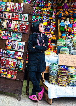 Streetwise vendor of local skullcaps and dolls, Masuleh, Iran, Middle East