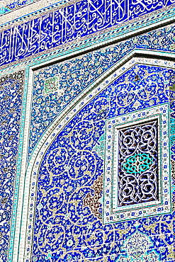 Detail of ceramic tiles on wall in Isfahan blue, Imam Mosque, UNESCO World Heritage Site, Isfahan, Iran, Middle East