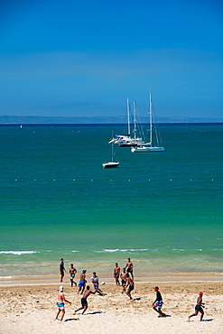 Locals playing rugby on the beach, Mossel Bay, Western Cape, South Africa, Africa