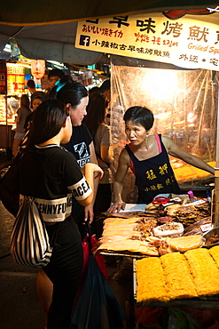 Vendor and customers, food stall, Shilin Night Market, Taipei, Taiwan, Asia