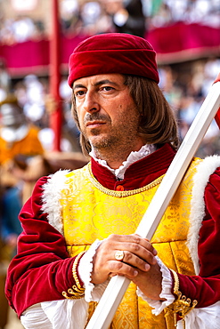 At the pageant that precedes the Palio race, representatives of each neighbourhood parade in traditional costume, Siena, Tuscany, Italy, Europe