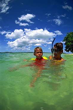 Mother and child in water, Munda, Solomon Islands, Pacific Islands, Pacific