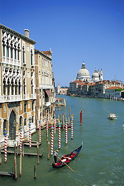 Gondolas on the Grand Canal with Santa Maria Della Salute church in the background, Venice, UNESCO World heritage Site, Veneto, Italy, Europe