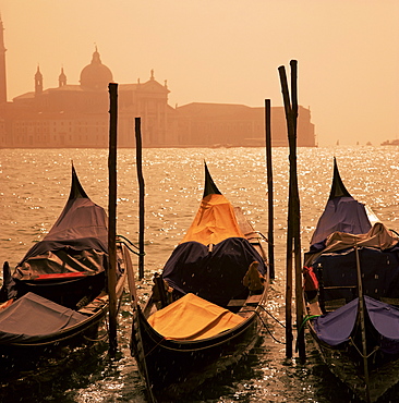 Gondolas on San Marco canal and church of San Giorgio Maggiore at sunset, Venice, Veneto, Italy, Europe