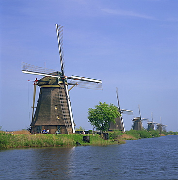 Windmills on the canal at Kinderdijk near Rotterdam, UNESCO World Heritage Site, The Netherlands, Europe