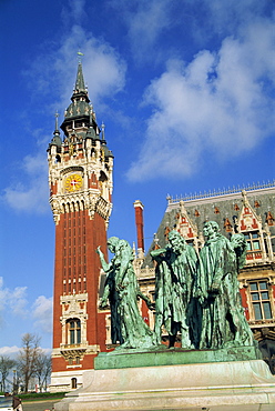 Monument to the burghers of Calais by Rodin, and the Hotel de Ville in Calais, Nord Pas de Calais, France, Europe