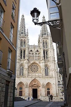 West front of Burgos cathedral, UNESCO World Heritage Site, seen from a narrow side street, Burgos, Castilla y Leon, Spain, Europe