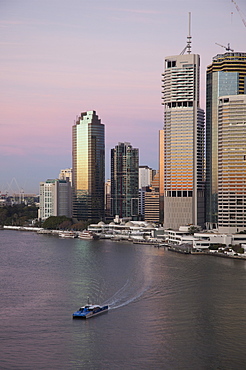 Catamaran ferry on Brisbane River and city centre, Brisbane, Queensland, Australia, Pacific