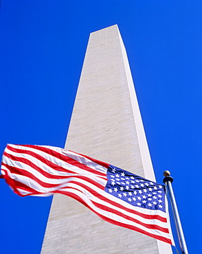 Memorial and the American flag, the stars and stripes flying in Washington DC, USA 