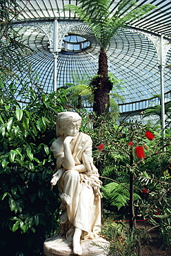 Statue in glasshouse at the Botanic Gardens, Glasgow, Scotland, United Kingdom, Europe