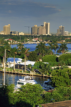 Aerial view over boats and houses on the harbour with the Fort Lauderdale skyline behind, Florida, United States of America, North America