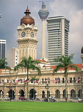 Sultan Abdul Samad Building and the KL Tower in the city of Kuala Lumpur, Malaysia, Southeast Asia, Asia