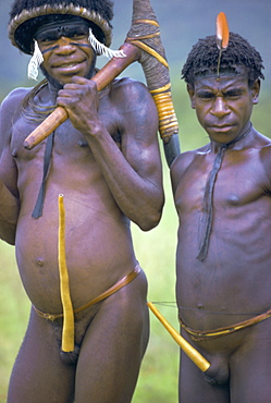 Portrait of two Dani tribesmen wearing penis gourds, Irian Jaya (West Irian) (Irian Barat), New Guinea, Indonesia, Asia