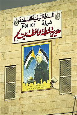 Poster showing Yasser Arafat on the wall of a Palestinian Police Station in Bethlehem, Israel, Middle East