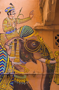 Typical house decorated with Mewar folk art of man riding elephant, Jagdish Mandir area, old city, Udaipur, Rajasthan state, India, Asia