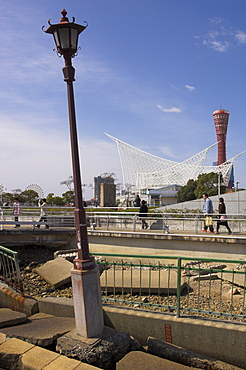 Port of Kobe Earthquake Memorial Park, memorial in foreground with Maritime Museum and Port Tower beyond, Meriken Park, Kobe, Kansai, Honshu, Japan, Asia