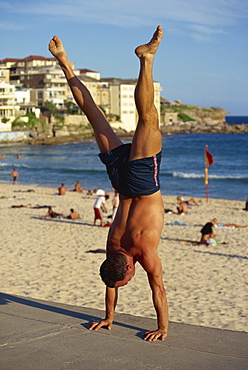 Acrobat on promenade, Bondi Beach, Sydney, New South Wales, Australia, Pacific