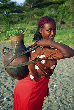 Portrait of woman fetching water, Ethiopia, Africa