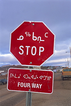 Stop sign in Iniktituk language, Iqaluit, Baffin Island, Canadian Arctic,Canada, North America