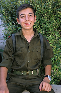 Portrait of a school boy in military uniform, Damascus, Syria, Middle East