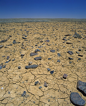 Cracked earth and rocks in the Outback of South Australia, Australia, Pacific