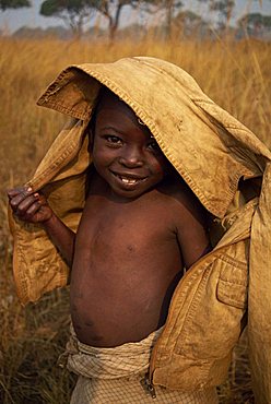 Portrait of young African child, smiling and looking at the camera, Kagenyi Camp, Zanzibar, Tanzania, East Africa, Africa