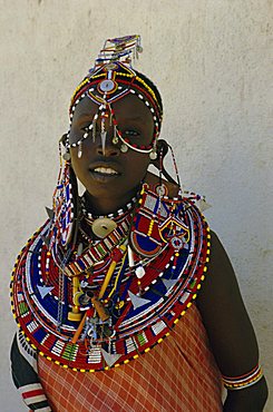 Portrait of a young Masai woman in traditional dress and jewellery, northern Kenya, Kenya, East Africa, Africa