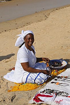 Hawker on beach at Saly, Senegal, West Africa, Africa