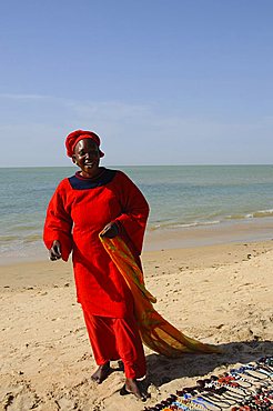 Hawker on beach at Saly, Senegal, West Africa, Africa