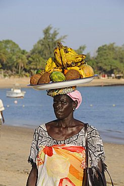 Hawker on beach at Saly, Senegal, West Africa, Africa