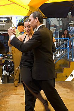 Tango dancers in restaurant in the La Boca district, Buenos Aires, Argentina, South America