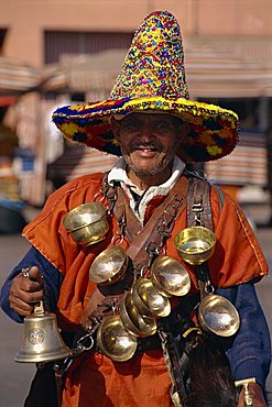 Waterseller on the Djemma el Fna, Marrakesh, North Africa, Africa