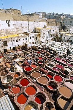 Elevated view over vats of dye, the tanneries, Fez, Morocco, North Africa, Africa