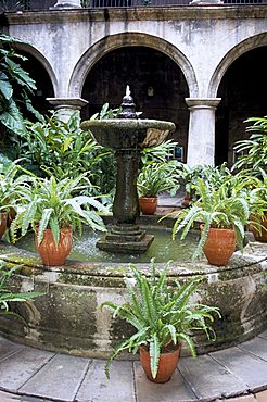 One of many lovely garden courtyards in Old Havana, Havana, Cuba, West Indies, Central America