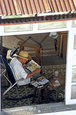 Old man painting, Calla Heridia, Santiago de Cuba, Cuba, West Indies, Central America