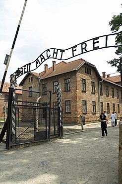 Entry gate with sign Arbeit Macht Frei (work makes you free), Auschwitz Concentration Camp, UNESCO World Heritage Site, Oswiecim, near Krakow (Cracow), Poland, Europe