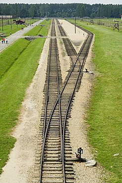 Railway line and platform where prisoners were unloaded and separated into able bodied men, kept for work, and woman and children who were taken to gas chambers, Auschwitz second concentration camp at Birkenau, UNESCO World Heritage Site, near Krakow (Cra