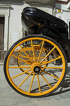 Horse carriage wheels, Santa Cruz district, Seville, Andalusia, Spain, Europe