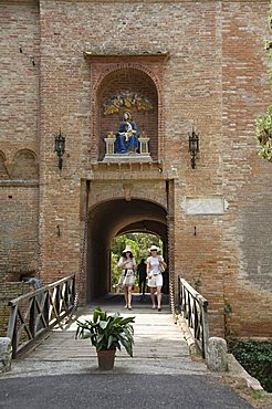 Entrance gate house, at the Benedictine Monastery famous for frescoes in cloisters depicting the life of St. Benedict, Monte Oliveto Maggiore, Tuscany, Italy, Europe