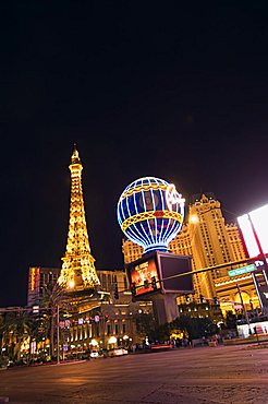 Paris Hotel with mini Eiffel Tower at night, The Strip (Las Vegas Boulevard), Las Vegas, Nevada, United States of America, North America