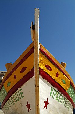 Close up of the prow of a traditional painted fishing boat, Albufeira, Algarve, Portugal