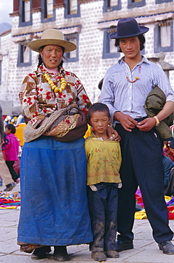 Portrait of a young Tibetan family, Lhasa, Tibet, China, Asia