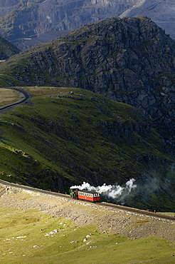 Steam train on route between Llanberis and the summit of Mount Snowdon in Snowdonia National Park, Gwynedd, Wales, United Kingdom, Europe