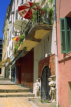 Balcony and house entrance in the ancient town, Ajaccio, island of Corsica, France, Mediterranean, Europe