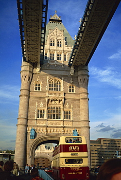 Detail of Tower Bridge, with double-decker bus passing through, London, England, Unnited Kingdom, Europe