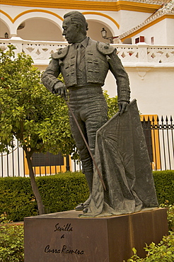 Statue of famous torrero Curro Romero in front of Plaza de Toros, La Maestranza, Seville, Andalucia, Spain, Europe


