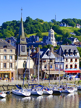 The Old Dock with pleasure boats moored, and St. Etienne Quay and church in the background, Honfleur, Auge, Normandy, France, Europe