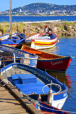 Old fishing boats, Etang de Thau Museum, Bouzigues, Thau basin, Sete town in the background, Herault, Languedoc, France, Europe